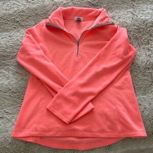 This is an old navy, neon pink half zip sweatshirt. It’s a size small.